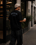 Polo oversize heavyweight DISCIPLINE OVER MOTIVATION para gym y streetwear confeccionado en algodón premium 20/1